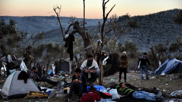 Refugees and migrants live at a field outside the Moria Hot Spot on the Greek Lesbos island on November 12, 2015 Refugees and migrants live at a field outside the Moria Hot Spot on the Greek Lesbos island on November 12, 2015 - Sputnik International