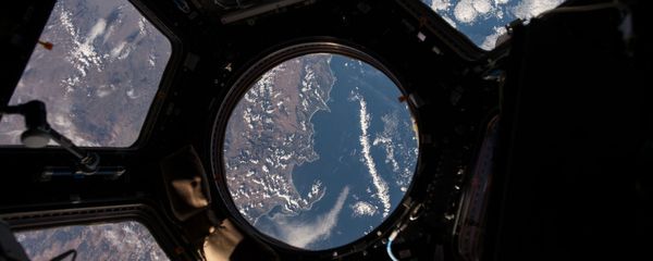 NASA astronaut Scott Kelly on the International Space Station took this Earth observation photo in the stations cupola that provides a 360 degree view. He tweeted this image with the comment: The view out my window. - Sputnik International