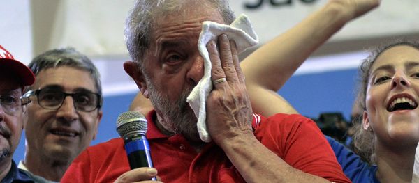 Brazilian former president Luiz Inacio Lula da Silva (C) wipes tears as he attends a meeting organized by unionists and members of the Workers Party (PT) in Sao Paulo downtown Brazil on March 4, 2016. Brazil's powerful Lula da Silva lashed out at prosecutors Friday after he was briefly detained by police as part of a probe into a massive corruption scheme Brazilian former president Luiz Inacio Lula da Silva (C) wipes tears as he attends a meeting organized by unionists and members of the Workers Party (PT) in Sao Paulo downtown Brazil on March 4, 2016. Brazil's powerful Lula da Silva lashed out at prosecutors Friday after he was briefly detained by police as part of a probe into a massive corruption scheme - Sputnik International