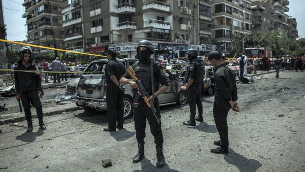 FILE -- In this June 29, 2015 file photo, Egyptian policemen stand guard at the site of a bombing that killed Egypt’s top prosecutor, Hisham Barakat, who oversaw cases against thousands of Islamists, in Cairo, Egypt FILE -- In this June 29, 2015 file photo, Egyptian policemen stand guard at the site of a bombing that killed Egypt’s top prosecutor, Hisham Barakat, who oversaw cases against thousands of Islamists, in Cairo, Egypt - Sputnik International