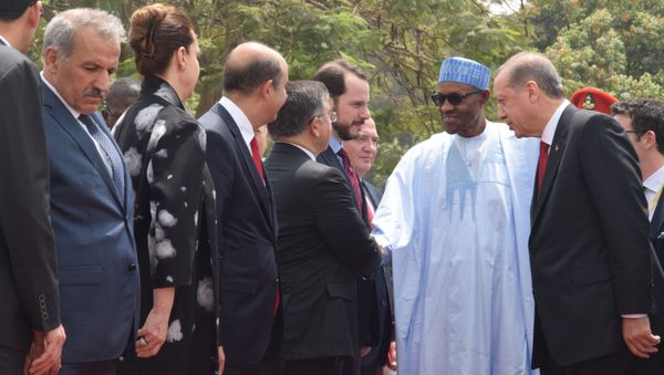 Turkey's President Recep Tayyip Erdogan, right, introduces Turkish businessmen to Nigerian President Muhammadu Buhari, during an official visit at the Presidential Palace in Abuja, Nigeria, Wednesday, March 2, 2016 - Sputnik International