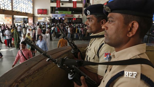 Railway policemen stand guard at a railway station following high alert in Ahmadabad, Gujarat state, India, Sunday, March 6, 2016 Railway policemen stand guard at a railway station following high alert in Ahmadabad, Gujarat state, India, Sunday, March 6, 2016 - Sputnik International