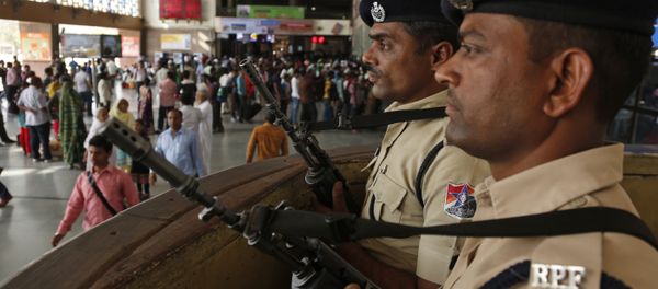 Railway policemen stand guard at a railway station following high alert in Ahmadabad, Gujarat state, India, Sunday, March 6, 2016 Railway policemen stand guard at a railway station following high alert in Ahmadabad, Gujarat state, India, Sunday, March 6, 2016 - Sputnik International