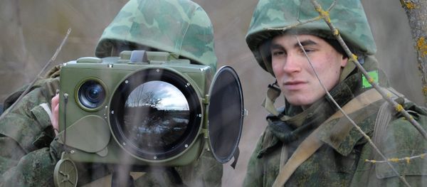 Soldiers of the technical intelligence unit handle an Ironia optical surveillance system during exercise of the Southern Military District special mission brigade in the Krasnodar Territory. The small-size multi-functional electronic optical device is designed for real-time obtaining and processing of information Soldiers of the technical intelligence unit handle an Ironia optical surveillance system during exercise of the Southern Military District special mission brigade in the Krasnodar Territory. The small-size multi-functional electronic optical device is designed for real-time obtaining and processing of information - Sputnik International
