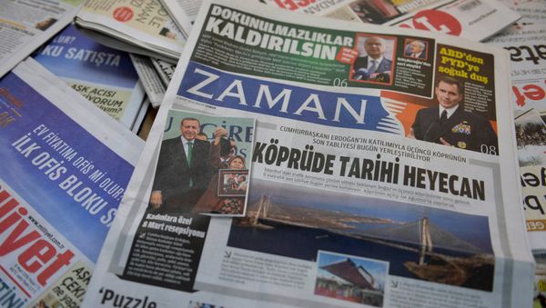 A photo taken in Ankara on March 6, 2016 shows the front page of the first new edition of the Turkish daily newspaper Zaman, which had staunchly opposed the president, now with articles supporting the government since its seizure by authorities - Sputnik International