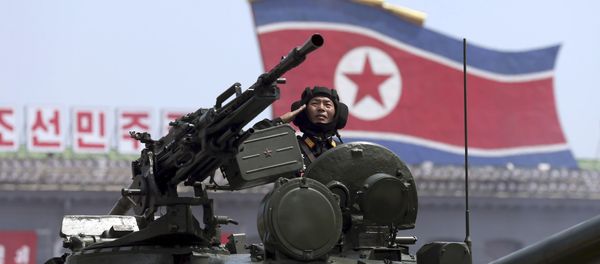 In this Saturday, July, 27, 2013, file photo, a North Korean soldier salutes while in a military tank as they parade through Kim Il Sung Sqaure during a mass military parade celebrating the 60th anniversary of the Korean War armistice in Pyongyang, North Korea - Sputnik International