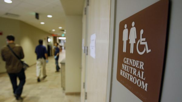 In this Aug. 23, 2007 file photo, a sign marks the entrance to a gender neutral restroom at the University of Vermont in Burlington, Vt. - Sputnik International