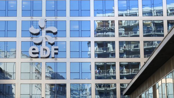 The logo of France's state-owned electricity company EDF is seen on the company's headquarters in Paris, France, February 16, 2016 - Sputnik International