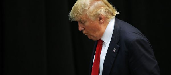 US Republican presidential candidate Donald Trump looks down as he leaves a campaign event in Concord, North Carolina March 7, 2016. - Sputnik International