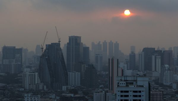 A partial solar eclipse is seen in Bangkok, Thailand, March 9, 2016. A partial solar eclipse is seen in Bangkok, Thailand, March 9, 2016. - Sputnik International