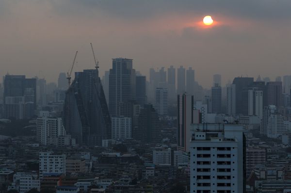 A partial solar eclipse is seen in Bangkok, Thailand, March 9, 2016. - Sputnik International