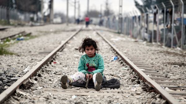 A child plays on a rail track at the Greek-Macedonian border near the village of Idomeni where thousands of migrants and refugees are stranded on March 7, 2016. - Sputnik International