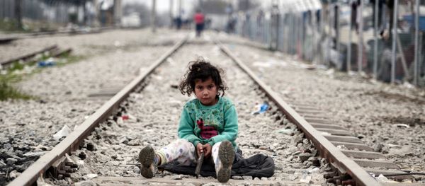 A child plays on a rail track at the Greek-Macedonian border near the village of Idomeni where thousands of migrants and refugees are stranded on March 7, 2016. A child plays on a rail track at the Greek-Macedonian border near the village of Idomeni where thousands of migrants and refugees are stranded on March 7, 2016. - Sputnik International