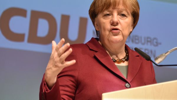 German Chancellor Angela Merkel gives a speech during a regional meeting of her Christian Democratic Union (CDU) party on January 30, 2016 in Neubrandenburg, northeastern Germany. - Sputnik International