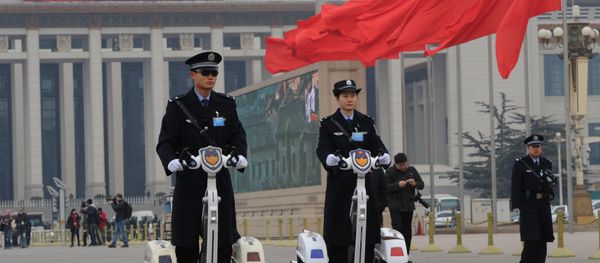 Police patrol outside the Great Hall of the People before the opening session at the 11th National Committee of the Chinese People's Political Consultative Conference (CPPCC) in Beijing on March 3, 2012. Police patrol outside the Great Hall of the People before the opening session at the 11th National Committee of the Chinese People's Political Consultative Conference (CPPCC) in Beijing on March 3, 2012. - Sputnik International