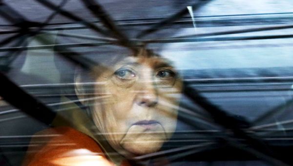 In this file photo Germany's Chancellor Angela Merkel arrives at an EU-Turkey summit in Brussels, as the bloc is looking to Ankara to help it curb the influx of refugees and migrants flowing into Europe, March 7, 2016. In this file photo Germany's Chancellor Angela Merkel arrives at an EU-Turkey summit in Brussels, as the bloc is looking to Ankara to help it curb the influx of refugees and migrants flowing into Europe, March 7, 2016. - Sputnik International