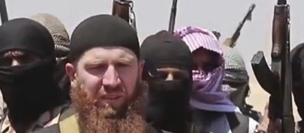 Omar al-Shishani standing next to the group's spokesman among a group of fighters as they declare the elimination of the border between Iraq and SyriaDaesh leader Abu Omar al-Shishani. (File) Omar al-Shishani standing next to the group's spokesman among a group of fighters as they declare the elimination of the border between Iraq and SyriaDaesh leader Abu Omar al-Shishani. (File) - Sputnik International
