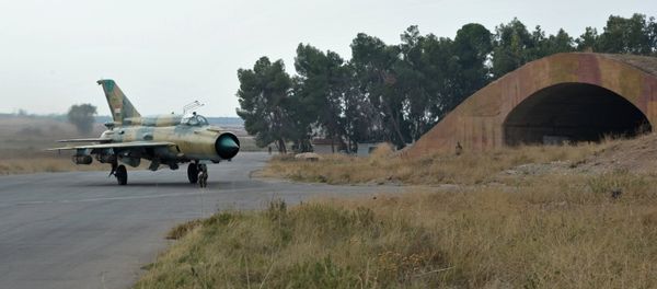 MiG-21 aircraft of the Syrian Air Force gets ready for a mission at the Hama airbase near the city of Hama, Syria's Hama Province MiG-21 aircraft of the Syrian Air Force gets ready for a mission at the Hama airbase near the city of Hama, Syria's Hama Province - Sputnik International