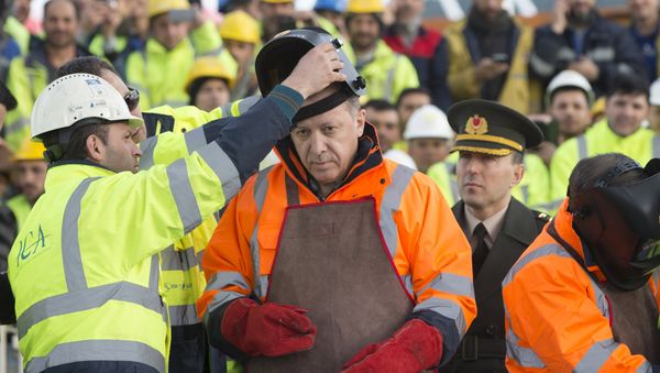 Turkey's President Tayyip Erdogan prepares for the welding of the final section of the Yavuz Sultan Selim Bridge, the Third Bosphorus Bridge, during a ceremony in Istanbul, Turkey, March 6, 2016 Turkey's President Tayyip Erdogan prepares for the welding of the final section of the Yavuz Sultan Selim Bridge, the Third Bosphorus Bridge, during a ceremony in Istanbul, Turkey, March 6, 2016 - Sputnik International