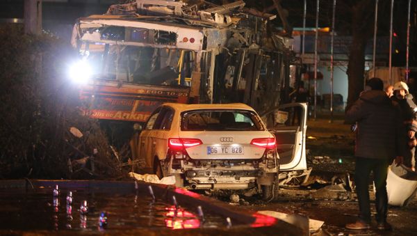 A man stands next to a burnt out bus after a blast in Ankara on March 13, 2016 A man stands next to a burnt out bus after a blast in Ankara on March 13, 2016 - Sputnik International