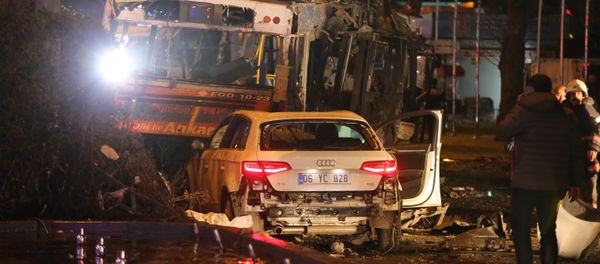 A man stands next to a burnt out bus after a blast in Ankara on March 13, 2016 A man stands next to a burnt out bus after a blast in Ankara on March 13, 2016 - Sputnik International