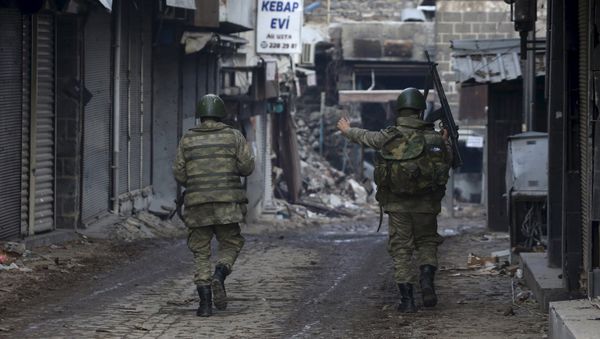 Turkish soldiers patrol in Sur district, which is partially under curfew, in the Kurdish-dominated southeastern city of Diyarbakir, Turkey February 26, 2016 - Sputnik International