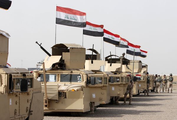 Iraqi security forces ride in vehicles travelling to Mosul to fight against militants of Islamic State at an Iraqi army base in Camp Taji in Baghdad, February 21, 2016 Iraqi security forces ride in vehicles travelling to Mosul to fight against militants of Islamic State at an Iraqi army base in Camp Taji in Baghdad, February 21, 2016 - Sputnik International
