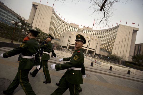 Chinese paramilitary police march past China's central bank, the People's Bank of China, in Beijing, Saturday, March 12, 2016 Chinese paramilitary police march past China's central bank, the People's Bank of China, in Beijing, Saturday, March 12, 2016 - Sputnik International