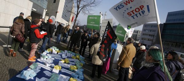 Opponents of the Transatlantic Trade and Investment Partnership (TTIP) protest outside the headquarters of the Christian Democratic Union (CDU) in Berlin, Germany, March 14, 2016 Opponents of the Transatlantic Trade and Investment Partnership (TTIP) protest outside the headquarters of the Christian Democratic Union (CDU) in Berlin, Germany, March 14, 2016 - Sputnik International