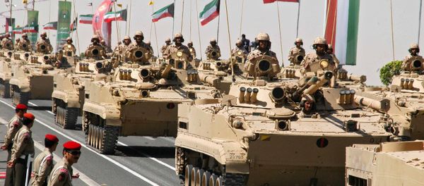 Kuwaiti armed forces sit on top of their tank during a military parade attended by the Emir of Kuwait Sheikh Sabah al-Ahmad al-Jaber al-Sabah in Kuwait City, 07 March 2007 Kuwaiti armed forces sit on top of their tank during a military parade attended by the Emir of Kuwait Sheikh Sabah al-Ahmad al-Jaber al-Sabah in Kuwait City, 07 March 2007 - Sputnik International