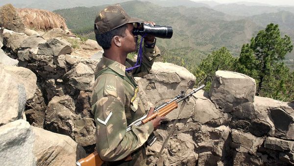 An Indian soldier looks through binoculars at a forward post somewhere in Mendhar sector 200 meters from the Line of Control separating Indian and Pakistan held Kashmir, some 100 Kms southwest of Srinagar (File) An Indian soldier looks through binoculars at a forward post somewhere in Mendhar sector 200 meters from the Line of Control separating Indian and Pakistan held Kashmir, some 100 Kms southwest of Srinagar (File) - Sputnik International