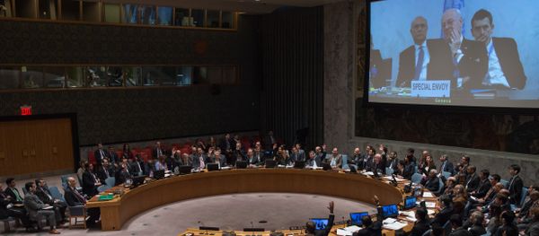 Staffan de Mistura, U.N. special envoy for Syria, is displayed on a video screen via video conference from Geneva, as the United Nations Security Council votes to support a resolution endorsing a cease-fire in Syria, Friday, Feb. 26, 2016 at United Nations headquarters - Sputnik International