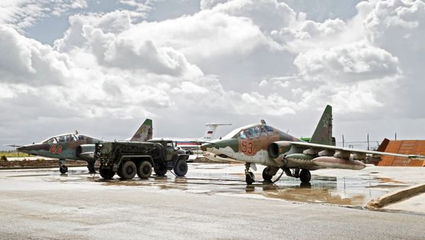 Sukhoi Su-25 ground-attack planes of the Russian Aerospace Forces prepare to depart from the Hmeimim airbase in Syria for their permanent location in Russia - Sputnik International