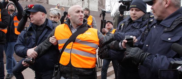 The arrest of journalist Graham Phillips at SS veterans' march in Riga, Latvia. March 16, 2016 The arrest of journalist Graham Phillips at SS veterans' march in Riga, Latvia. March 16, 2016 - Sputnik International