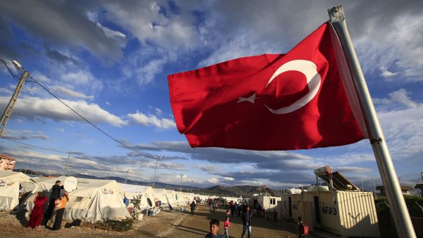 Turkish flag flies at the refugee camp for Syrian refugees in Islahiye, Gaziantep province, southeastern Turkey,Wednesday, March 16, 2016 - Sputnik International