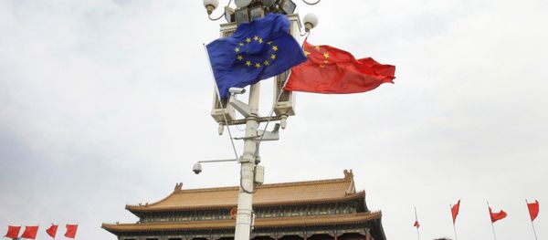 Visitors walk under flags of European Union and China in front of The Tiananmen Gate in Beijing (File) Visitors walk under flags of European Union and China in front of The Tiananmen Gate in Beijing (File) - Sputnik International