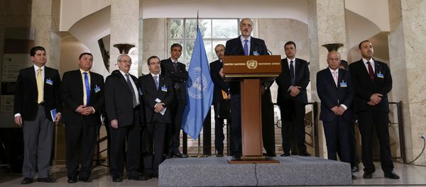 Syrian government delegation headed by Bashar al-Jaafari attends a news conference after a meeting on Syria at the European headquarters of the United Nations in Geneva, Switzerland, March 16, 2016 - Sputnik International
