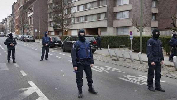 Police at the scene of a security operation in the Brussels suburb of Molenbeek in Brussels Police at the scene of a security operation in the Brussels suburb of Molenbeek in Brussels - Sputnik International