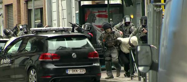Armed Belgian police apprehend a suspect, in this still image taken from video, in Molenbeek, near Brussels, Belgium, March 18, 2016. Belgian-born Salah Abdeslam, one of the main suspects from November's Paris attacks, was arrested after a shootout with police in Brussels on Friday, the Belgian federal prosecutor's office said. Armed Belgian police apprehend a suspect, in this still image taken from video, in Molenbeek, near Brussels, Belgium, March 18, 2016. Belgian-born Salah Abdeslam, one of the main suspects from November's Paris attacks, was arrested after a shootout with police in Brussels on Friday, the Belgian federal prosecutor's office said. - Sputnik International