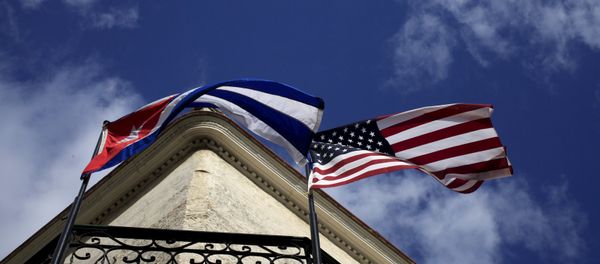 Cuban and US flags are seen on the balcony of a restaurant in downtown Havana, Cuba March 19, 2016. Cuban and US flags are seen on the balcony of a restaurant in downtown Havana, Cuba March 19, 2016. - Sputnik International