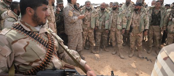 Fighters of the Desert Falcons self-defense unit during re-stationing of troops near the Syrian city of Palmyra. - Sputnik International