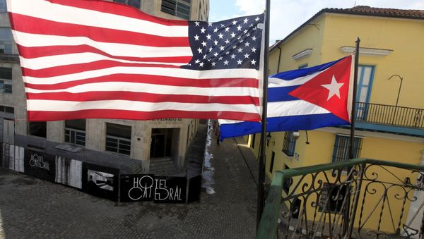 US and Cuban flags are seen on the balcony of a restaurant in downtown Havana, Cuba March 19, 2016. US and Cuban flags are seen on the balcony of a restaurant in downtown Havana, Cuba March 19, 2016. - Sputnik International
