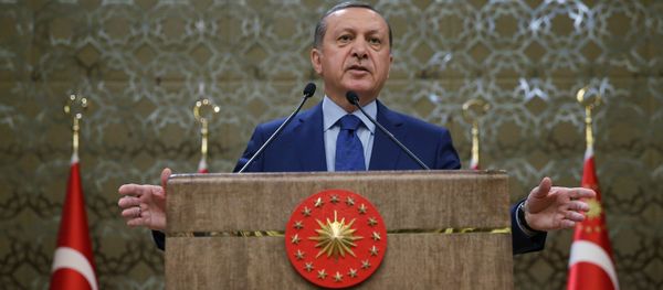 Turkish President Recep Tayyip Erdogan addresses a meeting of local administrators at his palace in Ankara, Turkey, Wednesday, March 16, 2016. Tayyip Erdogan says US and Russian weapons are ending up in the hands of the Kurdistan workers' Party, or PKK, which his country considers a terrorist organization - Sputnik International