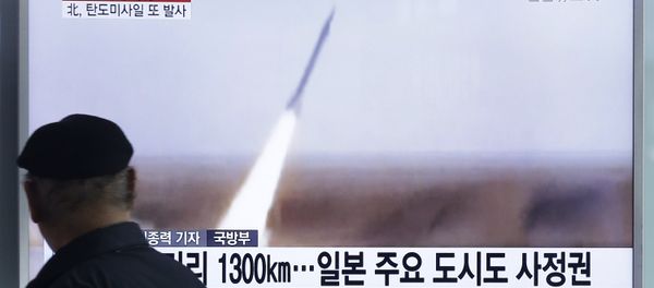 A man watches a TV screen showing a file footage of the missile launch conducted by North Korea, at Seoul Railway Station in Seoul, South Korea, Friday, March 18, 2016 - Sputnik International