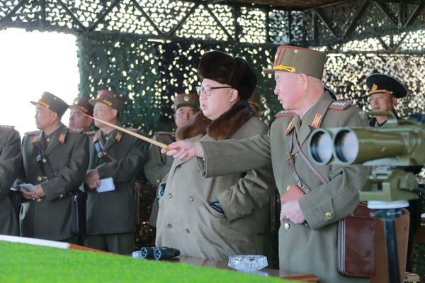 North Korean leader Kim Jong Un watches landing and anti-landing exercises being carried out by the Korean People's Army (KPA) at an unknown location, in this undated photo released by North Korea's Korean Central News Agency (KCNA) in Pyongyang on March 20, 2016 - Sputnik International