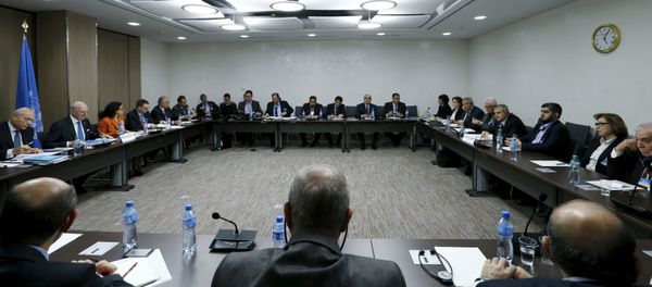 The delegation of the High Negotiations Committee (HNC) and U.N. mediator Staffan de Mistura are seen at the start of a meeting during Syria peace talks at the United Nations in Geneva, Switzerland, in this March 17, 2016 file photo - Sputnik International