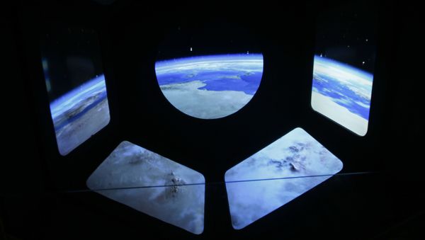 Once completed, the ground elements will eventually be supplemented by a trio of high-orbit satellites that will actually detect gravitational waves. Above: A reproduction of the view of the earth from a spaceship. Once completed, the ground elements will eventually be supplemented by a trio of high-orbit satellites that will actually detect gravitational waves. Above: A reproduction of the view of the earth from a spaceship. - Sputnik International