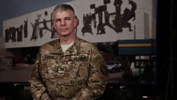 U.S. Army Col. Steve Warren, spokesman for the U.S.-led coalition against the Islamic State Group pauses during an interview with The Associated Press in Baghdad, Iraq, Thursday, March 10, 2016 - Sputnik International