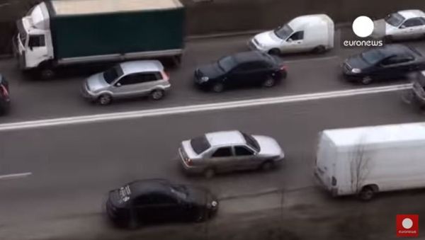 Ukrainian driver's unusual way of avoiding traffic jam...in reverse - Sputnik International