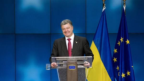 Ukraine President Petro Poroshenko smiles as he gives a press conference on the sidelines of of the EU Council in Brussels (File) Ukraine President Petro Poroshenko smiles as he gives a press conference on the sidelines of of the EU Council in Brussels (File) - Sputnik International